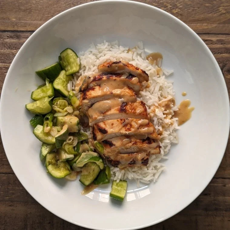 Miso marinaded chicken breast with cucumber salad and a miso sesame dressing